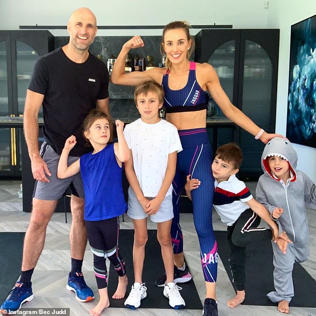 Living the dream! Rebecca and her husband, former AFL star Chris Judd, share four children, son Oscar, nine, daughter Billie, six and three-year-old twins Tom and Darcy (all pictured)