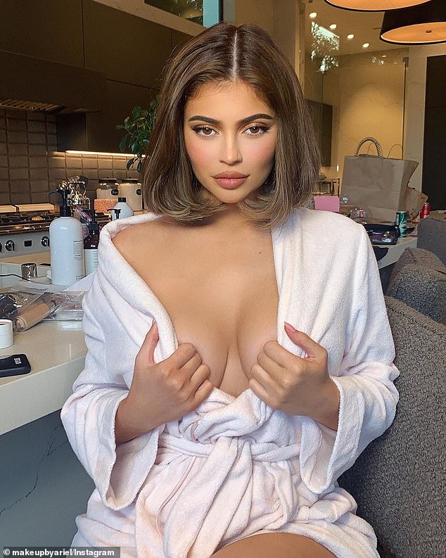 A new year: Kylie Jenner turned 23-years-old on Monday morning; here she is seen in her makeup room before plugging Kylie Skin
