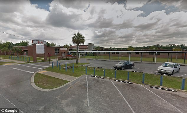 The teen, a student at Escambia High School (pictured), told police he